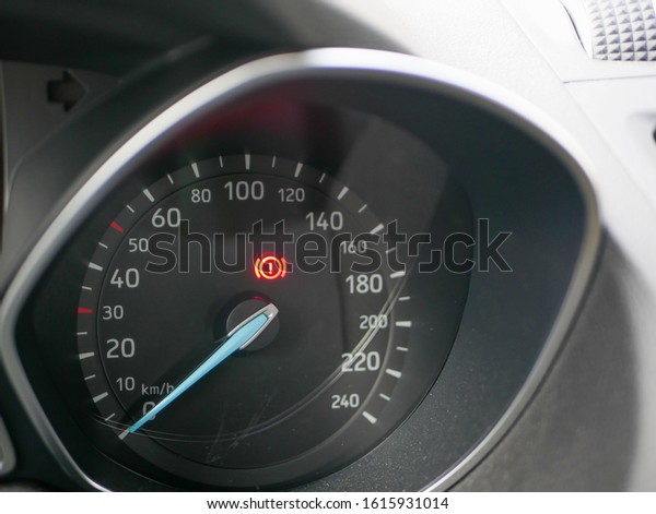 Error\
indicator on the car speedometer. Colorful error sign on a car\
dashboard. Need a car service. Car\
breakdown