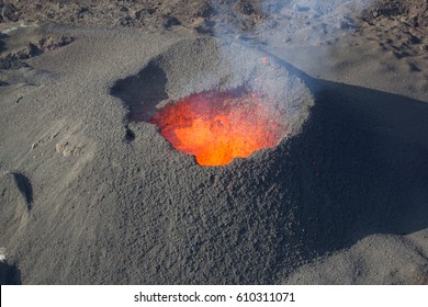 Erupting volcano, molten magma. Reunion island, France