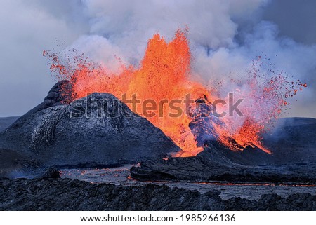 Erupting vulcano in iceland with melting lava
