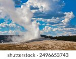 Eruption of Old Faithful Geyser at Yellowstone National Park in Wyoming.