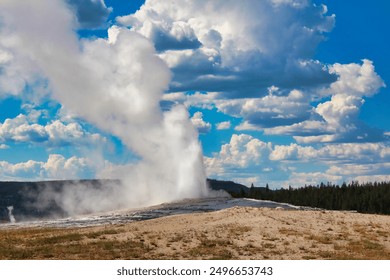 Eruption of Old Faithful Geyser at Yellowstone National Park in Wyoming. - Powered by Shutterstock