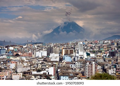 Eruption of Tungurahua Volcano above the city of Ambato in the Avenue of the Volcano's, Ecuador, South America. Lava flows away from the city into the deep valley between the city and volcano.