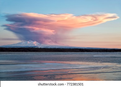 Eruption of the volcano at sunrise . DEC 05,2017:Russia,  Kamchatka Mountain. Shiveluch Volcano.(3307m) Active Volcano Of Kamchatka Peninsula.