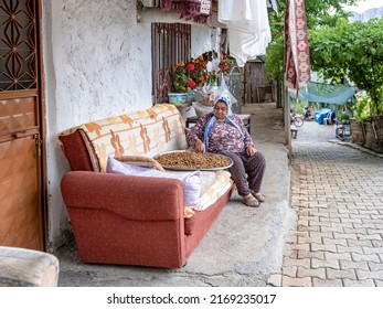 Erzincan Kemaliye Turkey
June 2022
A Woman Extracting Dried Mulberry Fruit