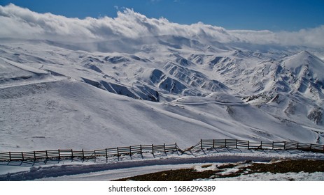 Erzurum Palandoken (Palandöken) Mountains And Cloudy Sky. Palandoken Ski Resort. Snowy Mountain Ranges.