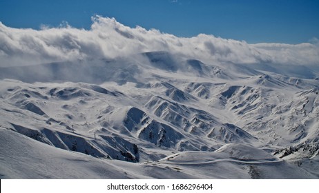 Erzurum Palandoken (Palandöken) Mountains And Cloudy Sky. Palandoken Ski Resort. Snowy Mountain Ranges.