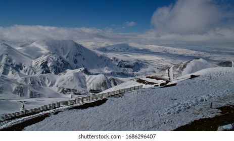 Erzurum Palandoken (Palandöken) Mountains And Cloudy Sky. Palandoken Ski Resort. Snowy Mountain Ranges.