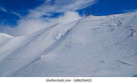 Erzurum Palandoken (Palandöken) Mountains And Cloudy Sky. Palandoken Ski Resort. Snowy Mountain Ranges.