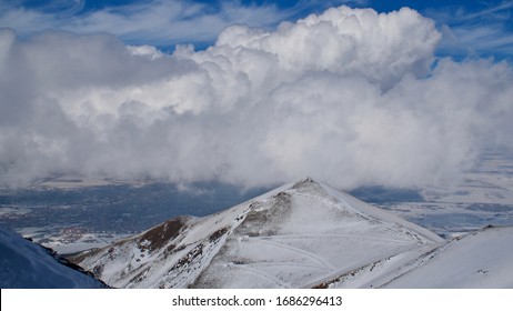 Erzurum Palandoken (Palandöken) Mountains And Cloudy Sky. Palandoken Ski Resort. Snowy Mountain Ranges.