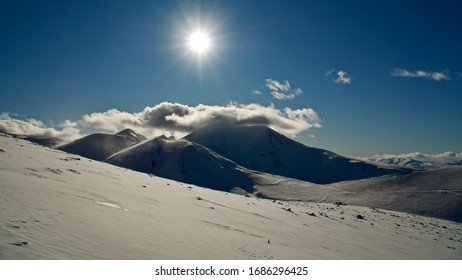 Erzurum Palandoken (Palandöken) Mountains And Cloudy Sky. Palandoken Ski Resort. Snowy Mountain Ranges.