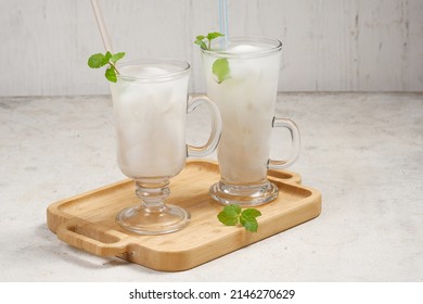 Es Kelapa Muda or young coconut ice, Indonesian popular drink,