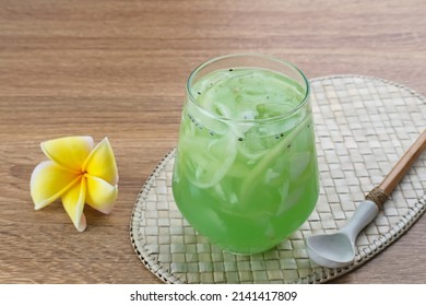 Es Kuwut, Traditional Balinese Fruit Cocktail Made From Young Coconut, Melon, Nata De Coco, Basil Seeds, Lime And Syrup. Space For Text