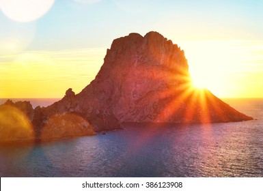 Es Vedra after the sunset, pastel colored sky at the mystic rock of Es Vedra, Ibiza Island.