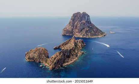 Es Vedra, a legendary rocky pyramidal islet west of Ibiza in the Balearic Islands, Spain - Mythical mountain rising above the Mediterranean Sea