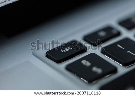 esc button, close-up. Laptop keyboard and exit from the project, concept