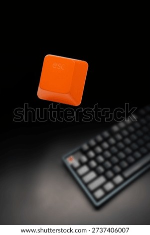 ESC Escaping, Floating Orange Escape Key Above Keyboard on Dark Background
