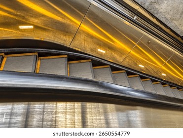 Escalator going down in a subway system
