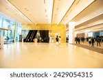 Escalator in a hall or commercial building with beautiful decoration, urban lifestyle