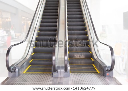 escalator isolated on white background. front view. escalator in subway station. Moving up staircase escalator.