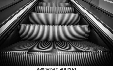 Escalator in motion. A visual metaphor for progress, flow, and structured vertical movement