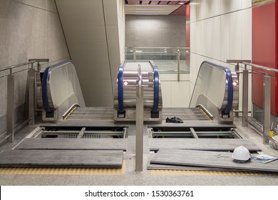 Escalator open control box for maintenance in railway station or building for passenger go up or go down between floor level. Selective focus.