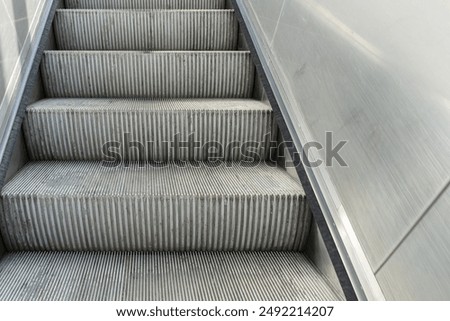 Escalator steps, moving staircase, empty metro elevator, electric stairway, metallic and ribbed textured moving stairs, escalator to success, future concept, industrial design, urban infrastructure