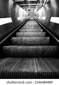 escalator for transporting people effortlessly from floor to floor with black and white effect