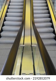 Escalators With Glowing Panels. Abstract Transportation And Modern Architecture Photo. Public  Building Interior Of Subway, Railway Station, Office Or Shopping Mall. Moving Staircase. Up And Down.