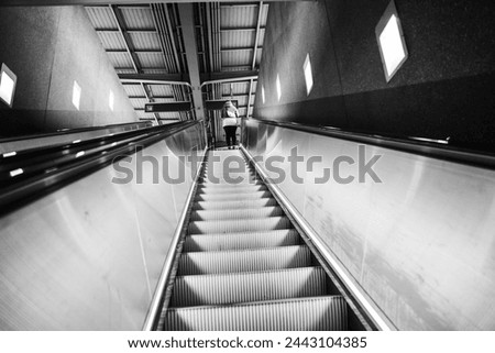 Escalators, stairs leading to the subway exit, exit from