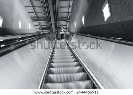 Escalators, stairs leading to the subway exit, exit from

