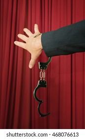 Escape Artist Performance, Uncuffed Hand On Stage