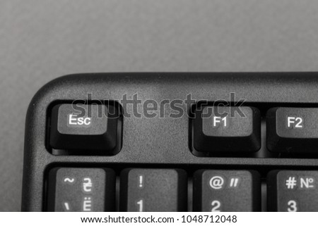 Escape button on the keyboard closeup, top view