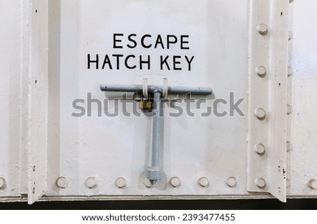 Escape Hatch 'T' Key on a ship for emergency use.