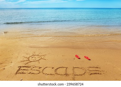 Escape Message On The Beach Sand - Vacation And Travel Concept