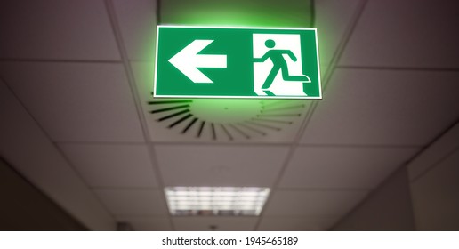 Escape Route Sign In An Office Building 