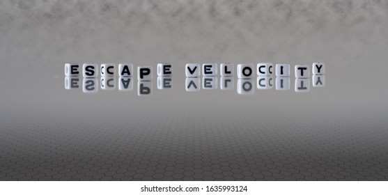 Escape Velocity Concept Represented By Wooden Letter Tiles