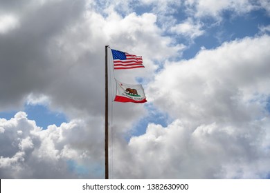 Escondido, California - February 17, 2019: Republic California Flag And USA American Flag On A Flag Pole