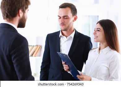 Escort Service Interpreter Works With The Transaction Accompanies Documents Conclusion Of The Contract Important Situation. Arab Businessman And His Translator Welcome Business Partner And Says Hello