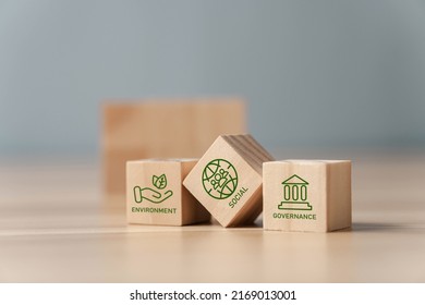 ESG Concepts on Environment, Society and Governance green wooden block icon esg investment esg sustainable corporate development environmental consideration - Shutterstock ID 2169013001