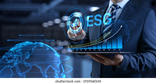 ESG environmental social governance business strategy investing concept. Businessman pressing button on screen. - Shutterstock ID 1919560145