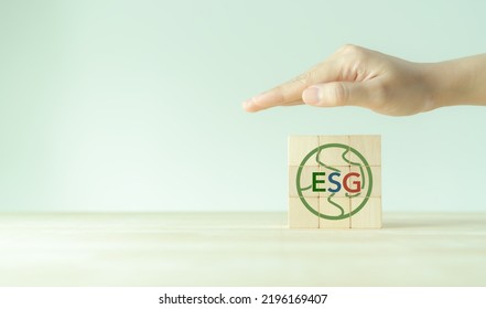 ESG And Sustainable Development Concept. Positive Impact For Environment, Social And Governance. Socially Responsible Investing, ESG Factors. Hand Protection The Earth With ESG Strategy Solution.