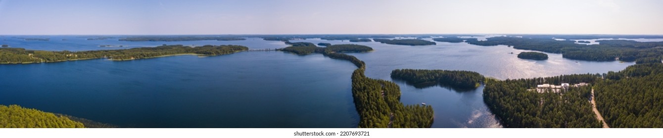 Esker road in Punkaharju in the middle of lake Saimaa, Finland - Shutterstock ID 2207693721