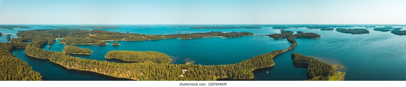 Esker road in Punkaharju in the middle of lake Saimaa, Finland - Shutterstock ID 2207694039