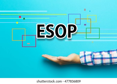 ESOP concept with hand on blue background