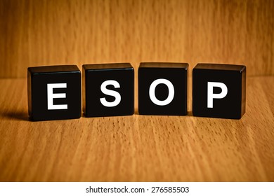 ESOP or employee stock option program text on black block