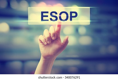 ESOP - Employee Stock Ownership Plan concept with hand pressing a button on blurred abstract background 
