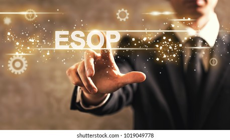 ESOP text with businessman on dark vintage background