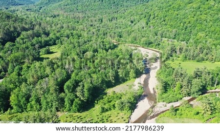 Esopus Creek flows through the Catskill Mountains and past Indian Grove in Big Indian, Shandaken, New York, USA 
