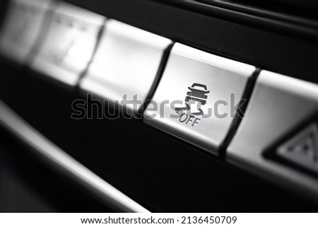 ESP electronic stability program control close up view. Interior detail of a modern car. ESP button photo
