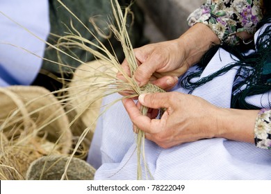 esparto woman hands handcrafts Mediterranean Balearic Islands - Powered by Shutterstock